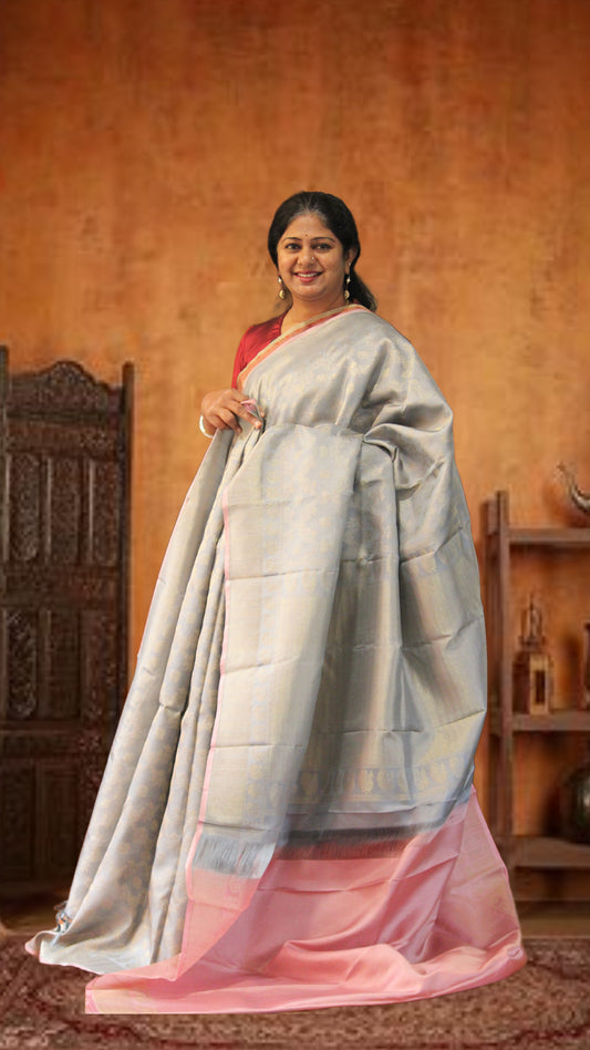 Bavanji border rich and detailed gold zari bavanji pallu on a silver grey Kanchipuram Silk Saree
